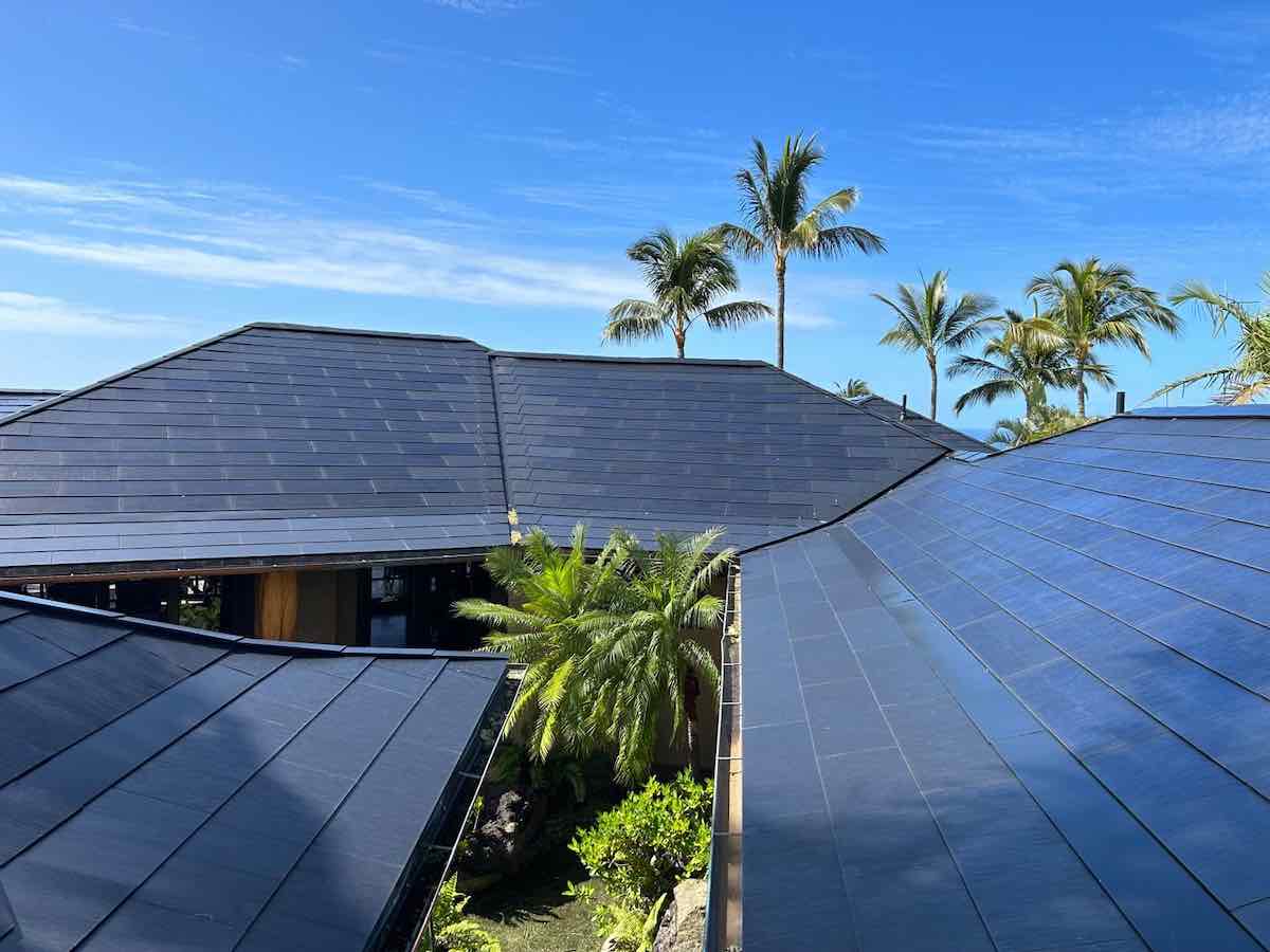 roofs made up of tesla solar panel shingles.
